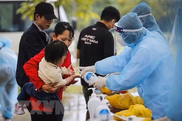 COVID-19: 1.063 sur le total des 1.180 infections ont été guéris au Vietnam ảnh 1
