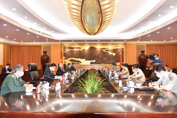  Le Vietnam et la Chine plaident pour un règlement adéquat des différends en mer ảnh 1