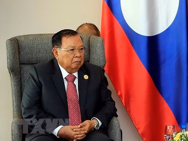 Le secrétaire général du PRPL reçoit la délégation du Parti communiste du Vietnam ảnh 1