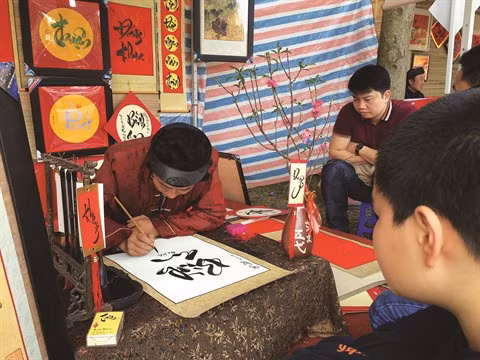Estampes populaires et calligraphies, chef-d’œuvres de décoration du Têt ảnh 1
