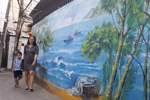 Dà Nang: des fresques murales en plein cœur de la ville ảnh 1
