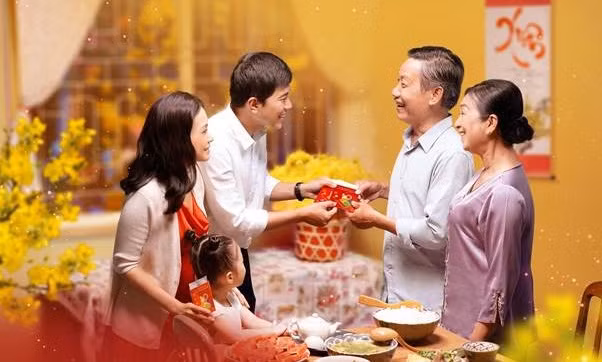 Têt : la coutume des « Lì xì » des Vietnamiens ảnh 1
