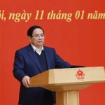 Le Premier ministre Pham Minh Chinh, également membre du Bureau politique, secrétaire du Comité du Parti du gouvernement, préside la conférence. Photo: VNA