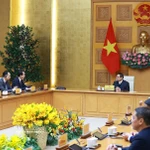 Le Premier ministre Pham Minh Chinh reçoit l'ambassadeur de Chine au Vietnam, He Wei. Photo : VNA