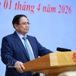 Le Premier ministre Pham Minh Chinh lors de la conférence. Photo: VNA