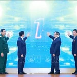 Le Premier ministre Pham Minh Chinh (3e à partir de la droite) à la cérémonie d'annonce et de lancement officiel de plusieurs systèmes informatiques du ministère de la Construction. Photo: VNA