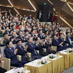 le secrétaire général du Parti, To Lam, et les délégués lors de l'événement. Photo: VNA