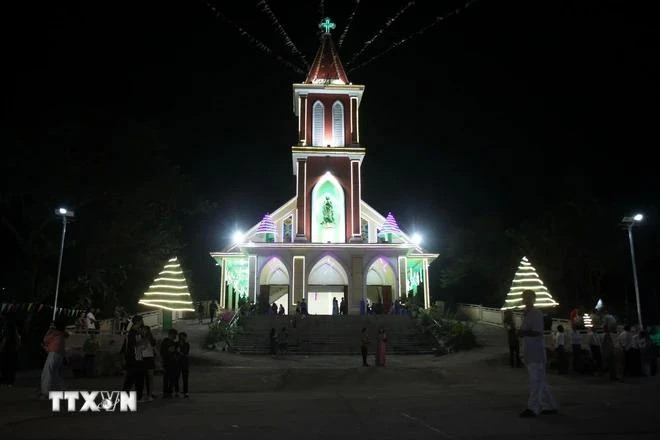 Célébration de Noël à l'église de Vi Tin dans la ville de Vi Thanh, province de Hau Giang (Photo : VNA) 1.jpg