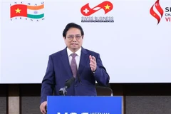 Le PM rencontre des entreprises à participation étrangère au Vietnam