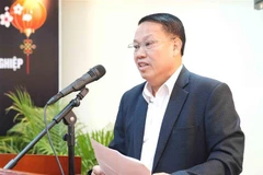 Les Vietnamiens au Laos fiers des réalisations exceptionnelles de leur pays natal