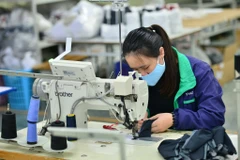 La production d'équipements de protection individuelle au Vietnam a été multipliée par six en 2020