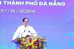 Le Premier ministre Pham Minh Chinh lors de la conférence. Photo: VNA