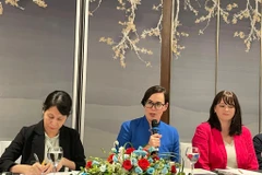 La sous-secrétaire d'État américaine au commerce et aux affaires agricoles étrangères, Alexis Taylor, à la conférence de presse, le 12 septembre à Hanoï. Photo: VNA