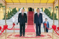 Le président To Lam et son homologue russe Vladimir Poutine. Photo: VNA