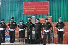 COVID-19 : dons pour des Vietnamiens au Cambodge et des militaires au Laos
