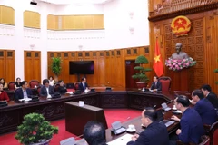 Le vice-Premier ministre Tran Hong Ha reçoit le directeur général de Samsung Vietnam Choi Joo Ho, le 12 août à Hanoï. Photo: VNA