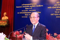Meeting en l’honneur du 40e anniversaire de la Fête nationale du Laos à Hanoi