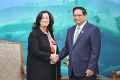 Le PM Pham Minh Chinh reçoivent des dirigeants de la BM et de la SFI