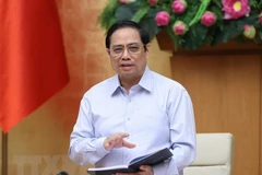 Le Premier ministre Pham Minh Chinh appelle à s’unir pour vaincre l’épidémie de Covid-19