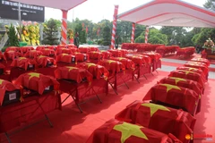 Nghê An : inhumation des restes de 103 soldats vietnamiens tombés au Laos