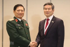 Activités du ministre vietnamien de la Défense au 18e Dialogue de Shangri-La