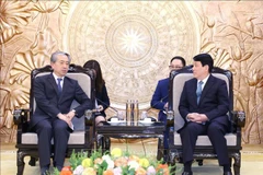 Le membre du Bureau politique, permanent du Secrétariat du Comité central du Parti communiste du Vietnam (PCV) Luong Cuong (droite) et l'ambassadeur de Chine Xiong Bo. Photo : VNA