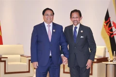 Le Premier ministre vietnamien Pham Minh Chinh (gauche) et le Sultan de Brunei Haji Hassanal Bolkiah. Photo : VNA