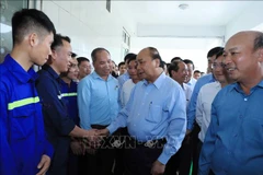 Le PM rencontre des travailleurs de la mine de charbon de Ha Lam