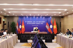 Le PM vietnamien au 11e sommet du Triangle de développement Cambodge-Laos-Vietnam 