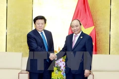 Le Premier ministre Nguyen Xuan Phuc reçoit des responsables de grands groupes de l'APEC