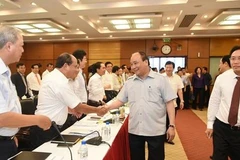 Le Premier ministre travaille avec des dirigeants de PetroVietnam