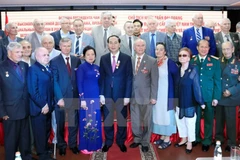 Le président Tran Dai Quang rencontre la diaspora vietnamienne et des amis russes