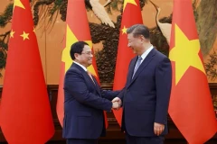 Le PM Pham Minh Chinh rencontre le dirigeant chinois Xi Jinping