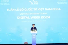 Le ministre de l'Information et de la Communication, Nguyên Manh Hung, s'exprime lorsd e l'ouvreture de la Semaine numérique internationale du Vietnam 2024. Photo: VietnamPlus 