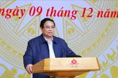 Le Premier ministre Pham Minh Chinh s’exprime lors de la 10e réunion du du Conseil central d’émulation et de récompense, à Hanoi, le 9 décembre. Photo : VNA