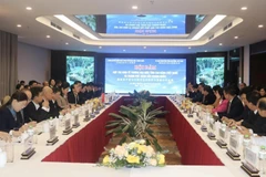 Lors des entretiens entre la province vietnamienne de Cao Bang et la ville chinoise de Baise, dans la région autonome Zhuang du Guangxi. Photo: VNA