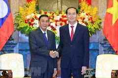 Le président Trân Dai Quang reçoit le chef du bureau présidentiel laotien