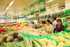 Marché de détail vietnamien : terrain de jeu des géants mondiaux