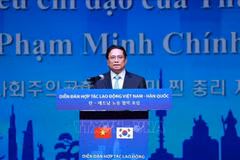 Le PM Pham Minh Chinh au Forum de coopération en matière de travail Vietnam-R. de Corée. Photo: VNA