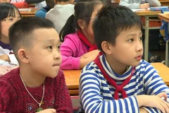 L’enseignement à titre d’essai du coréen et de l'allemand dans des écoles