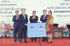 Banquet en l’honneur de la visite officielle du président de l’AN du Laos au Vietnam