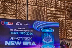 Lors du premier forum technologique international iTech Expo au Vietnam, à Hô Chi Minh-Ville. Photo :CVN/VNA