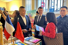 Rencontre entre des entreprises vietnamiennes et françaises. Photo : VNA