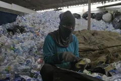Le recyclage de déchets en Thaïlande. Photo : Bloomberg