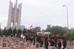 Cérémonie de commémoration et d'inhumation des restes de soldats volontaires et experts vietnamiens tombés au Laos. Photo: VNA