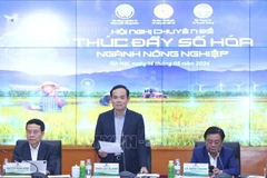 Le vice-Premier ministre Tran Luu Quang à la conférence thématique sur la promotion de la numérisation dans l'agriculture. Photo: VNA
