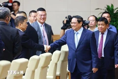 Le Premier ministre Pham Minh Chinh rencontre des entreprises chinoises. Photo: VNA