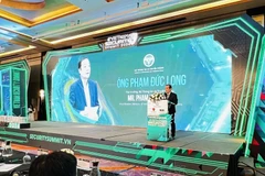 Le vice-ministre de l'Information et des Communications, Pham Duc Long au Sommet sur la sécurité du Vietnam 2024. Photo: VNA