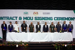 Signature d'accords lors des DSA et NATSEC en Malaisie. Photo: Benama
