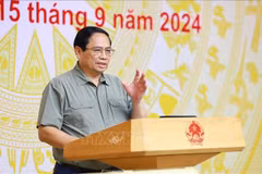 Le Premier ministre Pham Minh Chinh appelle à agir pour régler efficacement les conséquences du typhon Yagi et atteindre l'objectif de croissance. Photo : VNA